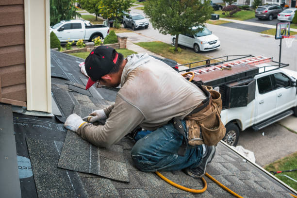 Professional Roofing technician working in Sunman, IN